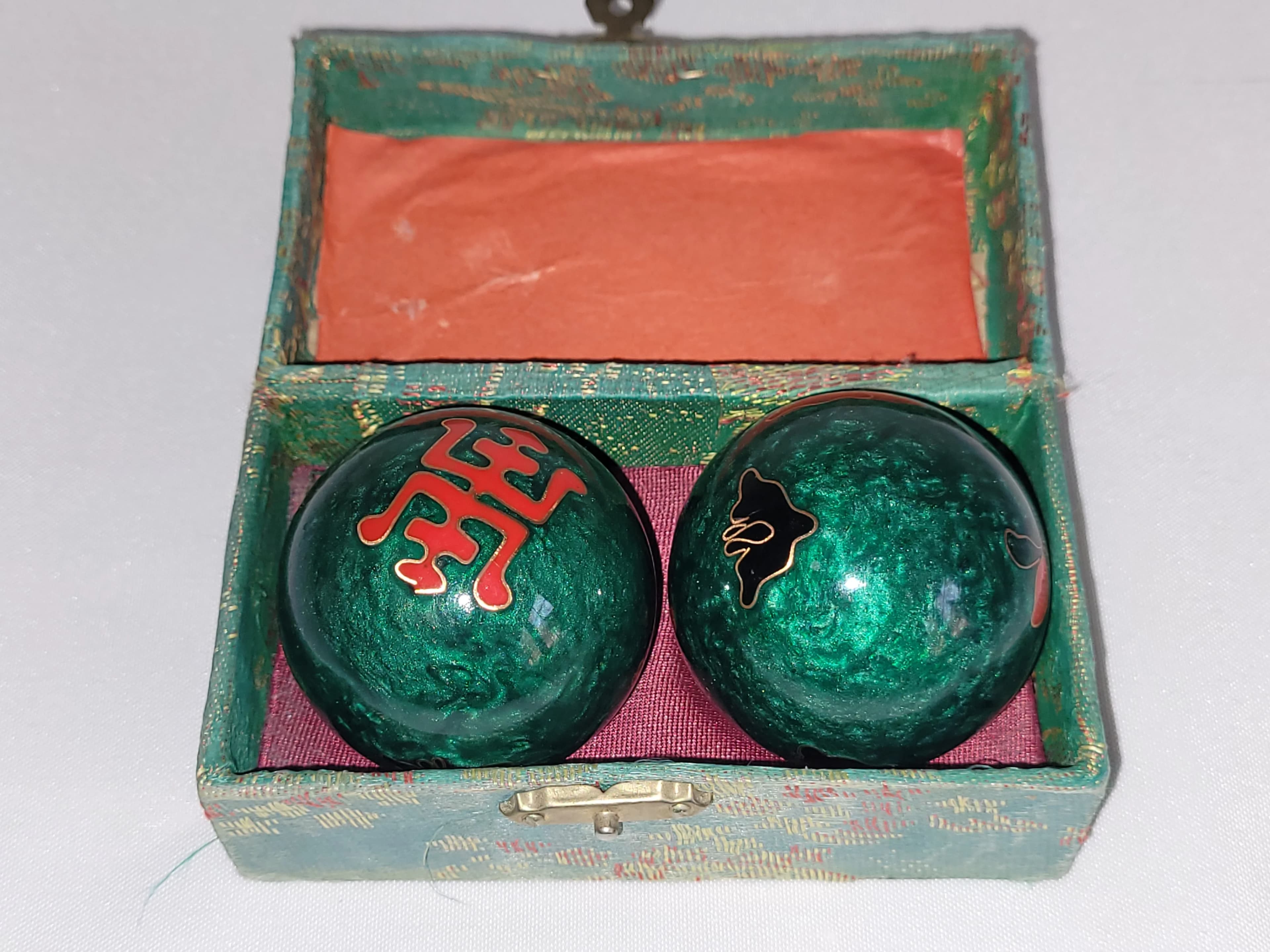 Boules de relaxation chinoises vertes avec motifs