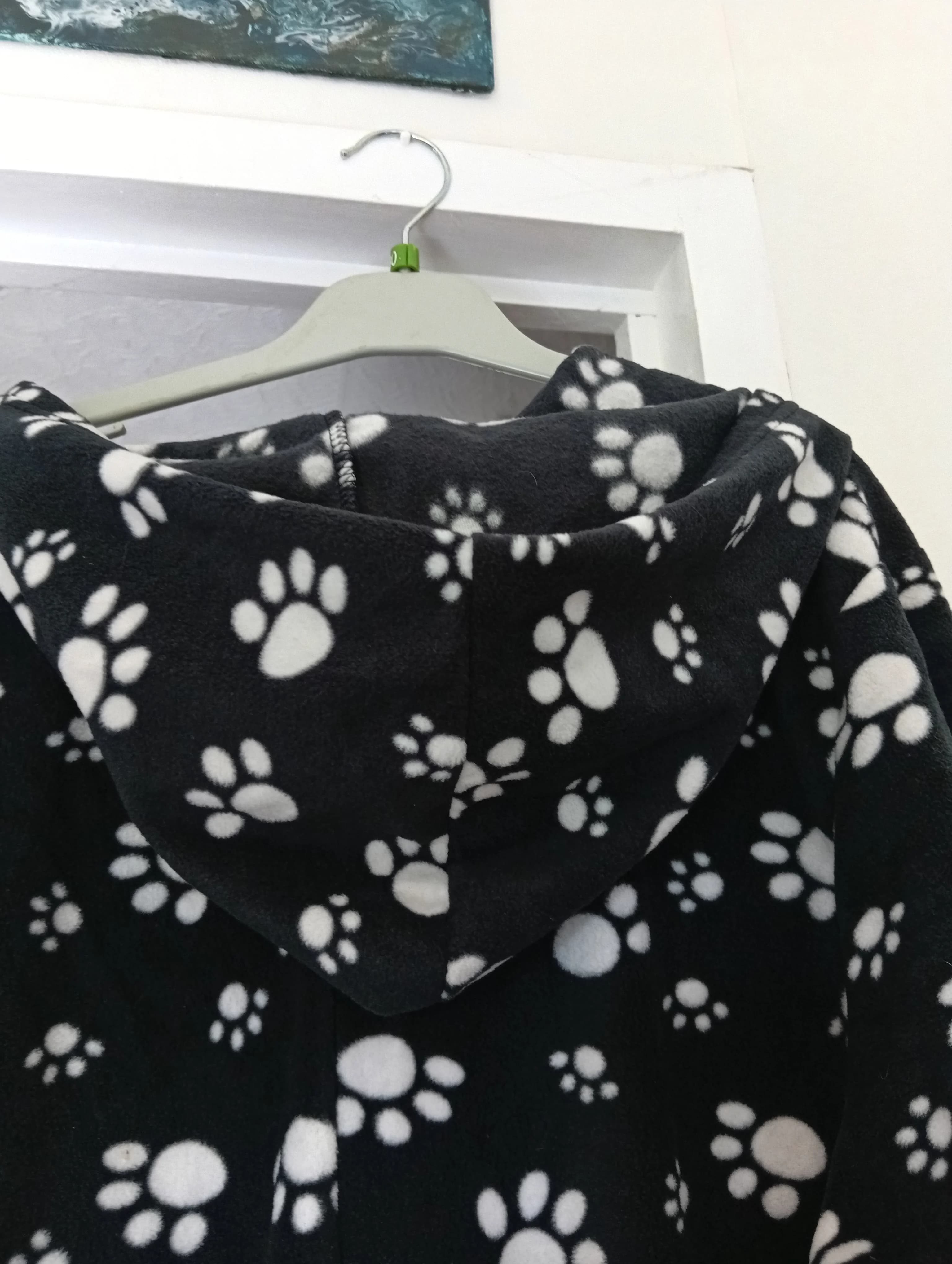 Pyjama combinaison noir motif pattes taille M — photo 3